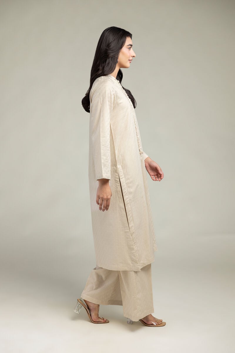 Beige Solid Pants Main image